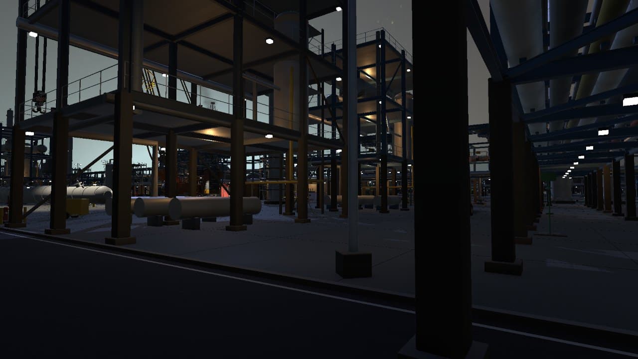 The refinery at night under work lights